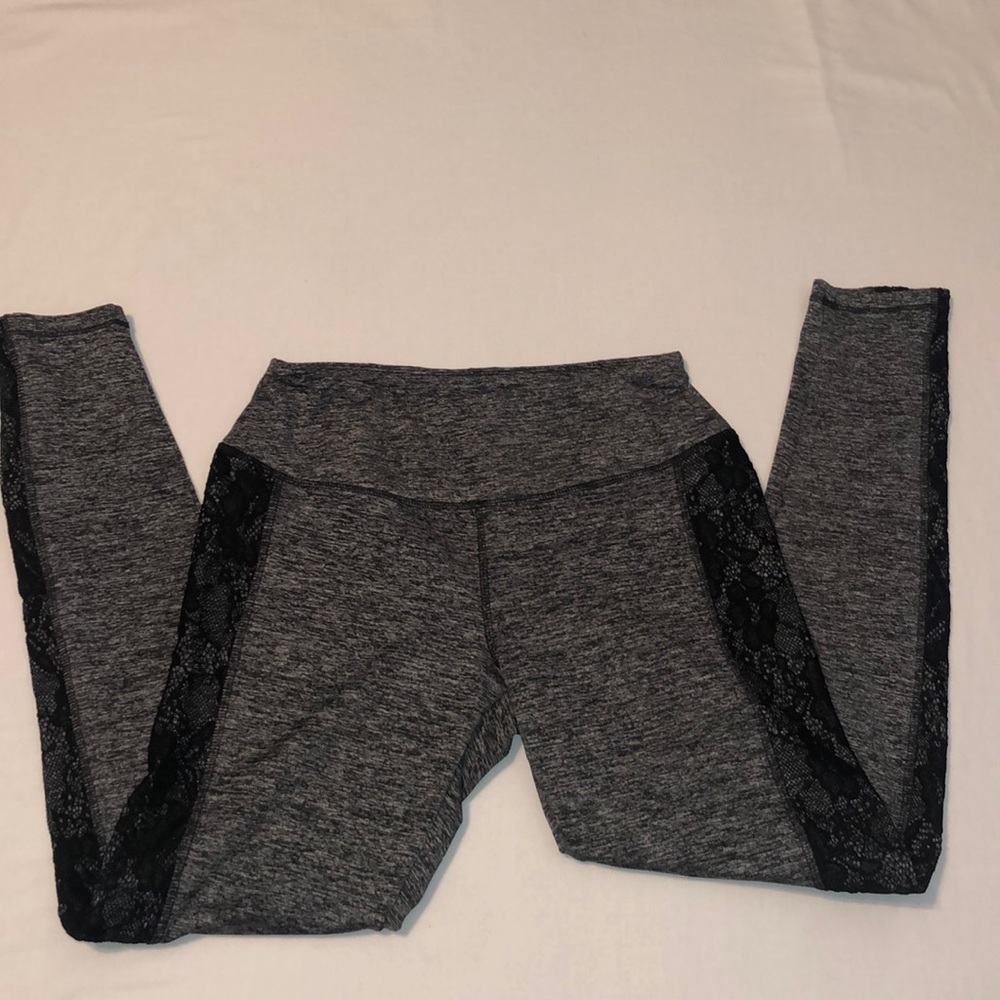 Maurices Woman’s medium leggings. Black lace down sides. Pocket in waist band